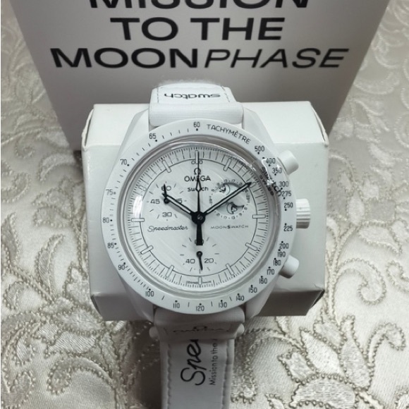 Meet the Posher Other - Omega x Swatch Moonswatch Mission to the Moonphase Full Moon White Snoopy